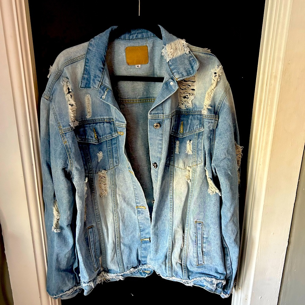 Distressed denim jacket